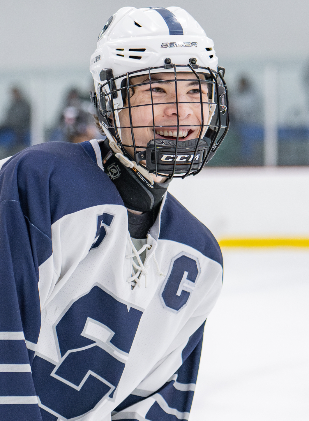 On the ice in hockey gear